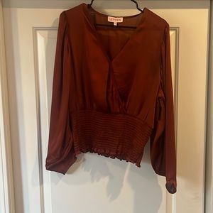 Boutique blouse. Gorgeous satin deep red/orange color.